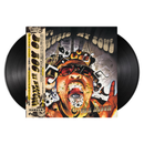 Vinyl record with a colorful cover featuring a face and text on a white background