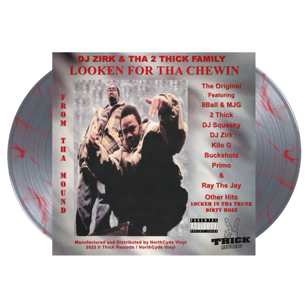 Vinyl record with cover featuring two men and text on a white background