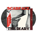 Vinyl record with 'Scarface' album cover featuring a black and white illustration and red text.