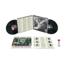 Vinyl record set with cover and liner notes on a white background