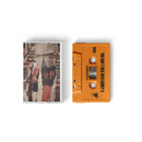 An orange cassette tape labeled You Don't Mess with Crime 3 next to its case featuring an image of a person wearing a hat.
