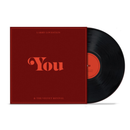 Vinyl record with red cover featuring the word 'You' on a white background