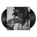 Vinyl album cover of At The Church Steps with Jim Jones in sunglasses and the apollo in the background