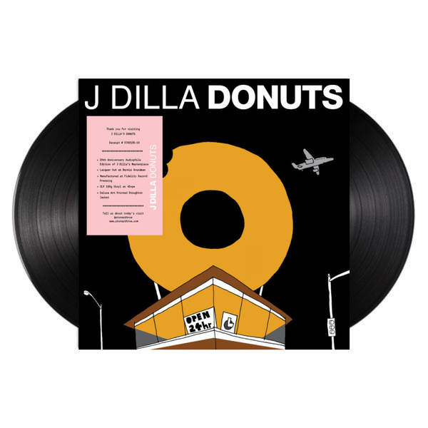 black Vinyl record with 'J Dilla Donuts' cover featuring a donut and building illustration.