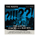 Album cover for 'The Roots Come Alive Too: DYWM 30 Live at Blue Note NYC' featuring a band on stage with large question marks.