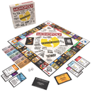 Monopoly game set with colorful property cards and deed sheets on a white background