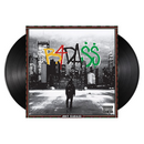 Joey Bada$$'s debut studio album 'B4.DA.$$' on a black vinyl record with a stylized cityscape cover.